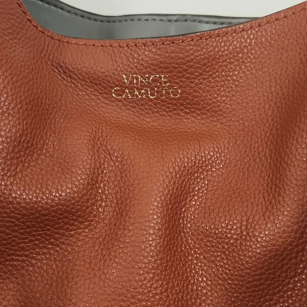 Vince Camuto Brown Orange Leather Hobo Bag.